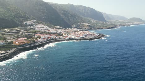 Drone-push-in-to-reveal-quaint-ocean-view-town-near-Port-Garachico-Tenerife-Spain
