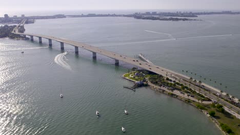 Aerial-view-of-downtown-Sarasota-causeway-and-boats-in-water