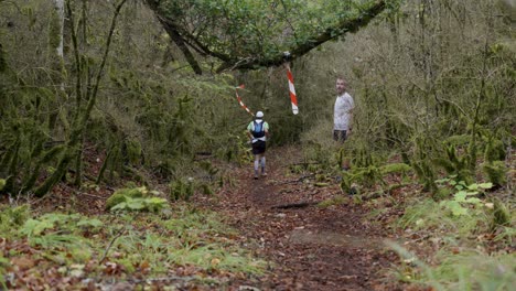 Slow-motion-capture-of-runners-sprinting-though-rugged-trail-of-Grand-Trail-des-Templiers