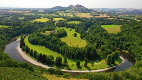 Aerial-Footage-Of-The-River-Tweed-And-Eildon-Hills-in-the-Scottish-Borders,-Scotland