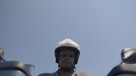 Black-Male-on-Driving-Motorbike-on-Street,-Beach-Police,-Law-Enforcement,-POV,-4K-|-Looking-Around,-Shaky,-Road,-Travel,-Waiting-for-Passing-Cars