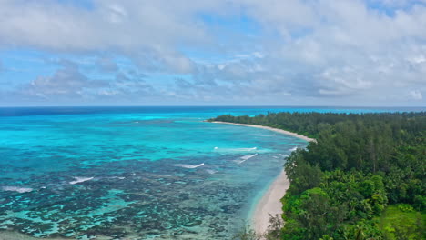 Aerial-drone-view-of-picturesque-tropical-deserted-beach-in-the-Seychelles-Islands