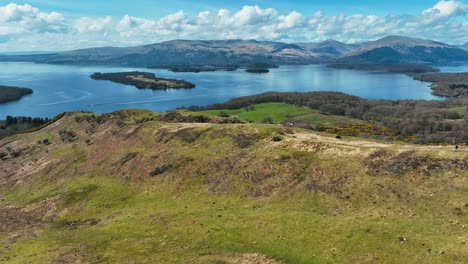 Aerial-Over-Conic-Hill-Towards-Loch-Lomond-on-Sunny-Day,-Scottish-Hills