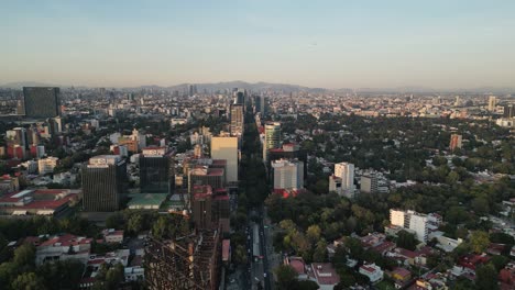 Aerial-views-of-buildings-on-Insurgentes-Avenue-in-CDMX,-captured-from-a-drone