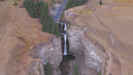 Bighorn-water-fall-is-flown-over-offering-a-spectacular-point-of-view-as-seen-from-an-aerial-drone-in-the-Ya-Ha-Tinda-Ranch-are-of-Alberta-Canada
