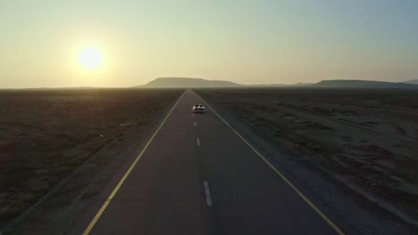 aerial-drone-view-A-cinematic-drone-short-where-the-drone-camera-is-following-a-car