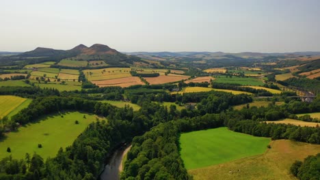 Aerial-View-of-Scottish-Borders-Over-The-River-Tweed-Looking-Towards-Eildon-Hills-and-Melrose,-Views-of-Scotland