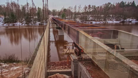 Time-lapse-of-an-old-bridge-being-replaced-by-a-newly-constructed-bridge