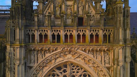 Ornament-on-famous-Den-Bosch-gothic-Saint-John-tower-epic-crane-up-till-spire-with-cross