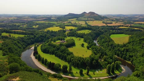 Views-of-Scotland,-Aerial-View-Of-The-River-Tweed-And-Eildon-Hills-in-the-Scottish-Borders,-Scotland