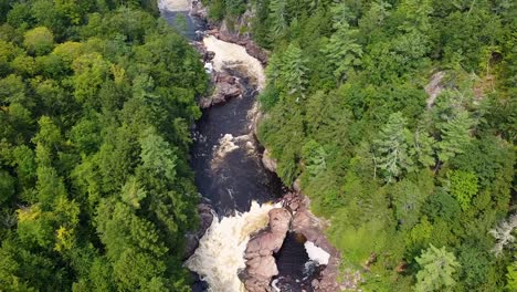 Static-overhead-drone-shot-of-rocky-river-area