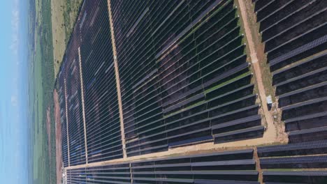 Vertical-shot-of-Photovoltaic-park-with-solar-panels-in-Cumayasa,-La-Romana,-Dominican-Republic