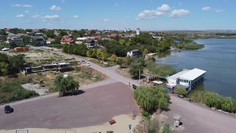 Aerial-drone-shot-panning-from-the-right-to-the-left-over-the-Danube-Delta,-located-near-the-Black-Sea-in-Jurilovca,-in-Tulcea-County,-in-Romania