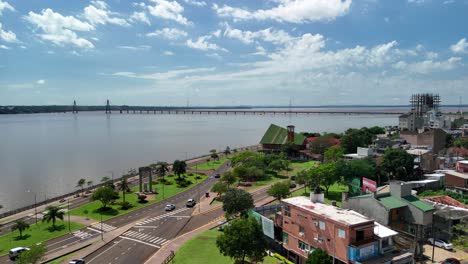Panoramic-180-degree-drone-view-capturing-the-enchanting-cityscape-of-Posadas,-Misiones,-Argentina