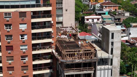 Diligent-workers-shaping-the-future-on-a-rooftop-construction-site
