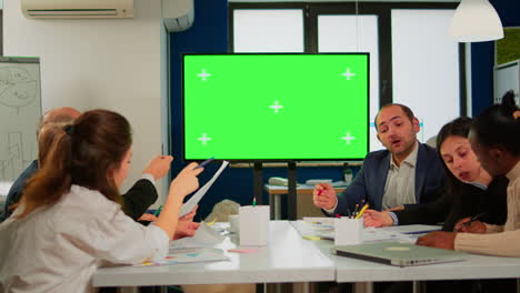 In-corporate-office-meeting-room-stands-green-mock-up-screen-TV