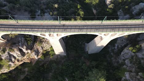 Drone-view-of-the-large-historical-bridge-built-in-the-canyon