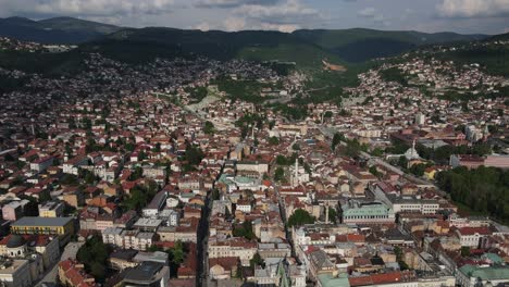 Aerial-view-the-busy-street-of-the-marketplace-and-the-town-square-and-the-view-of-the-Bascarsi-mosque-in-Bosnia