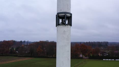 Tall-metal-lookout-tower-to-prevent-forest-fire,-aerial-pedestal-up