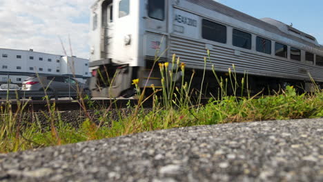 Low-perspective-viewpoint-of-a-train-car-moving-along-track