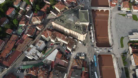 National-library-of-Sarajevo,-aerial-drone-view-of-the-historical-old-town-hall,-rich-city-of-Bosnia-where-cultural-heritages-coexist