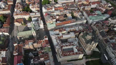 Aerial-drone-view-of-historical-Bosnian-city-planning-scheme,-view-of-houses-roofs-and-streets