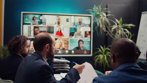 Business-associates-meeting-with-stakeholders-on-a-videocall-connection,