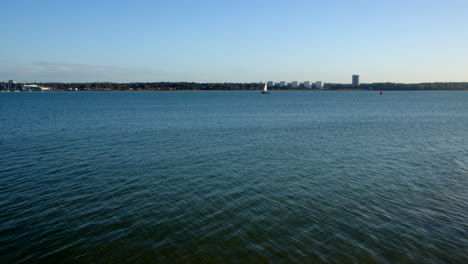 Wide-Shot-of-Weston,-Southampton,-taking-across-the-Solent-at-Hythe-Marina