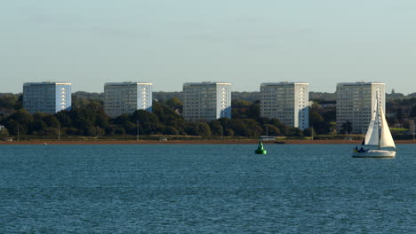 Shot-of-Weston’s-tower-blocks-on-international-way-taken-from-Hythe-Marina-with-sailboat-in-foreground