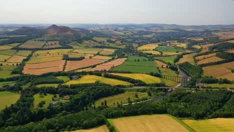 Aerial-View-of-Scottish-Countryside,-Eildon-Hills,-Leaderfoot-Bridge-and-Melrose,-Scottish-Borders,-Scotland,-United-Kingdom