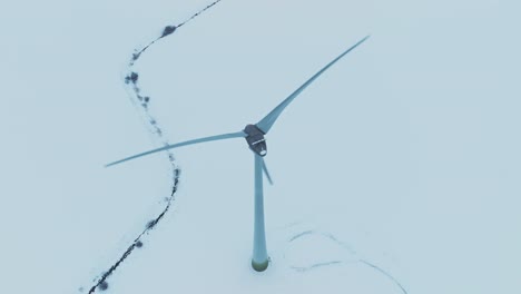 Aerial-view-Wind-turbine-blades-spin-and-produce-electricity-for-consumers