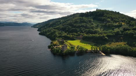 From-Clans-to-Clouds:-Urquhart-Castle's-Aerial-Majesty-on-Scotland's-Loch-Ness,-Near-Inverness,-Scottish-Highlands