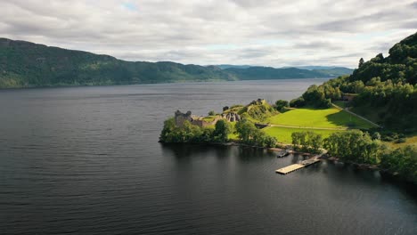 A-Bird's-Eye-View-of-Historic-Urquhart-Castle,-Over-Scotland's-Treasured-Loch-Ness,-Scottish-Highlands