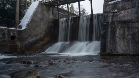 Waterfall-At-Alton-Mill-In-Caledon,-Winter-Landscape-Time-Lapse