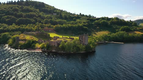 Aerial-Pullback-of-Urquhart-Castle-on-Loch-Ness,-Scotland,-United-Kingdom