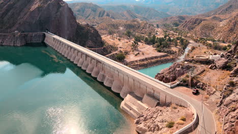 Drone-image-of-the-immense-Atuel-River-dam-in-San-Rafael,-Mendoza