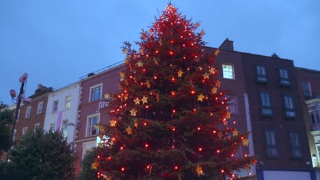 Large-decorated-christmas-tree-with-red-lights-in-Dublin-city-center