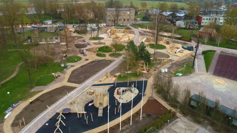 Aerial-new-development-house-complex-and-playground-area-in-Riga,-Latvia