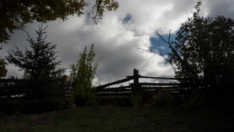 Watching-heavy-clouds-pass-from-backyard.-Time-lapse