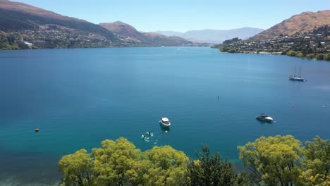 Aerial-UHD-shot-of-Queenstown-lakes-on-perfect-sunny-day