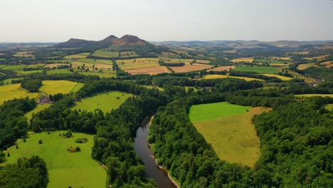 Drone-Shot-Over-The-River-Tweed-in-The-Scottish-Borders,-Scottish-Landscape-in-Summer,-Melrose,-Scotland