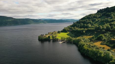 Aerial-Mystique-of-Urquhart-Castle,-Presiding-over-Loch-Ness,-Views-of-Scotland,-Scottish-Highlands,-Inverness,-Scotland