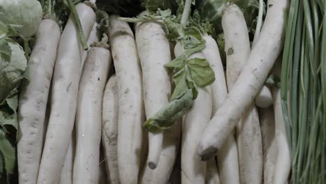 fresh-white-radish-at-vegetable-store-for-sale-at-evening