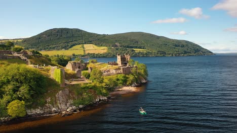 Nessie's-Neighbour:-Aerial-Mystique-of-Urquhart-Castle,-Presiding-over-Loch-Ness,-Inverness,-Scottish-Highlands,-Scotland