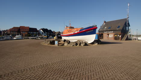Extra-wide-shot-of-an-RNLI-lifeboat-set-in-a-roundabout-at-Hythe-Marina