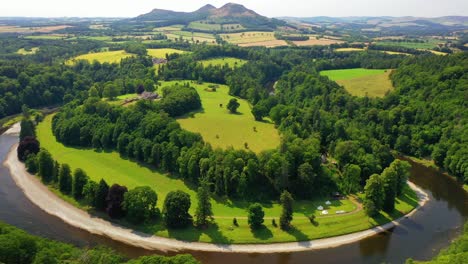 Aerial-View-Of-The-River-Tweed-And-Eildon-Hills-in-the-Scottish-Borders,-Scotland
