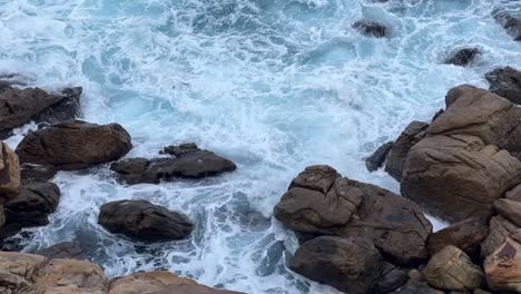 Sea-waves-crashing-into-a-natural-rock-formation
