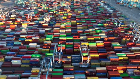 Container-terminal-at-Port-of-Virginia,-Norfolk---stacked-colorful-containers,-cranes