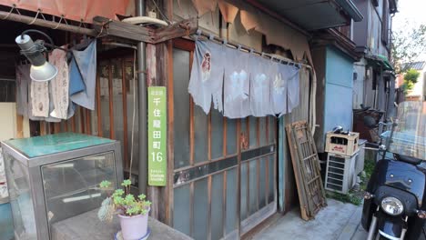 Close-up-of-Old-Abandoned-Shop-in-shopping-street-in-Tokyo-Japan