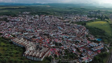 Almodovar-del-Rio-cityscape,-province-of-Cordoba-in-Andalusia,-Drone